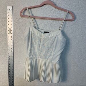 Elegant cream white Pleated bottom with embroidered front Women's Top,shirt.